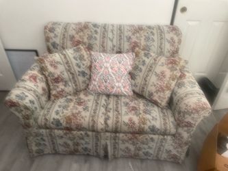 vintage loveseat with a pullout bed