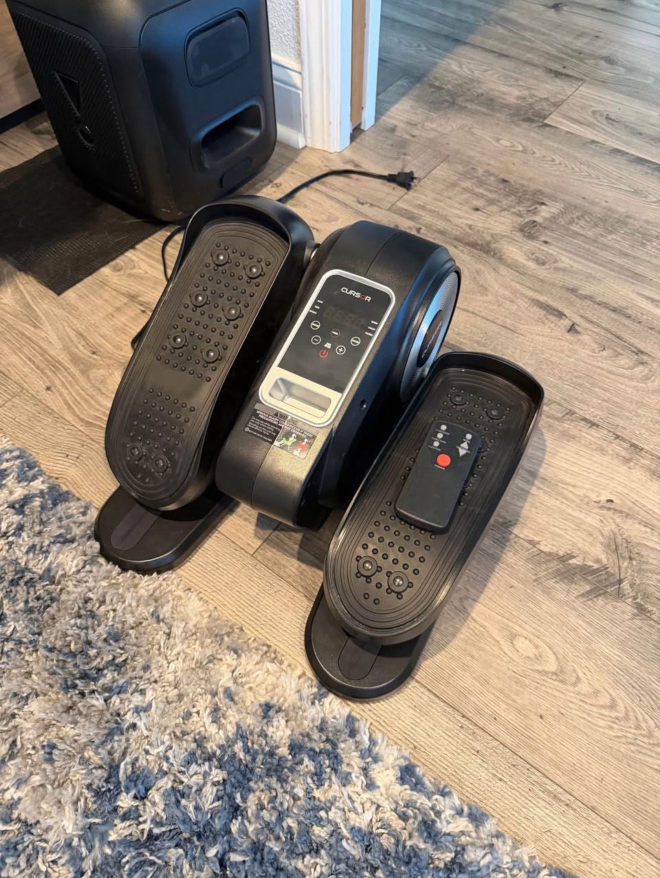 Under desk elliptical exercise machine