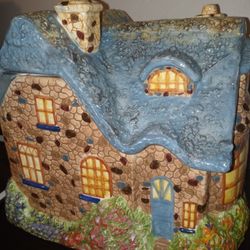 Thomas Kinkade Cottage Ceramic Cookie Jar Canister 2005 Everett's 1st Birthday
measures 9" x 7" x 9". 