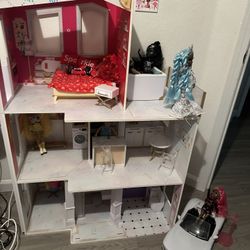 Rainbow, high house, car and dolls in new condition the car 