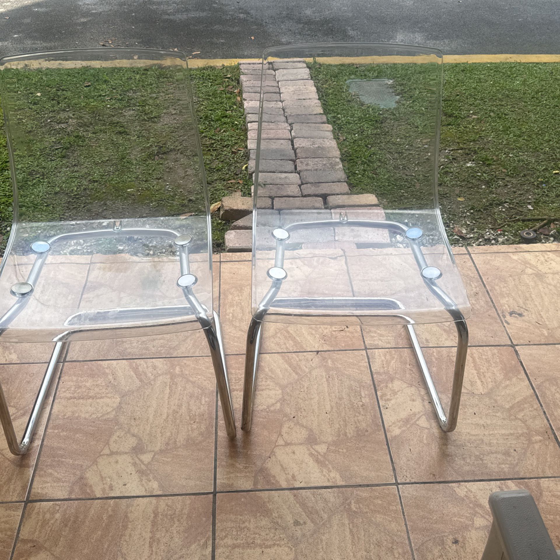 Two Clear Dining Chairs