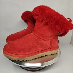Size 7 US red UGG Bailey Bow II Boots, which feature fixed satin bows