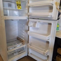GE
17.5 cu. ft. Top Freezer Refrigerator in White, ENERGY STAR NEW OPEN BOX ITEM WITH DENT ON TOP