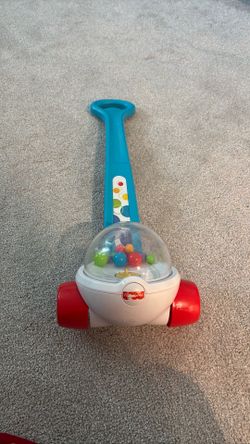 Toddler push along ball popper