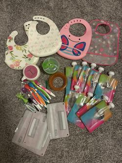 Bundle of Feeding baby Spoons pouches containers bibs