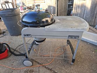 Price is firm.. Weber performer charcoal BBQ