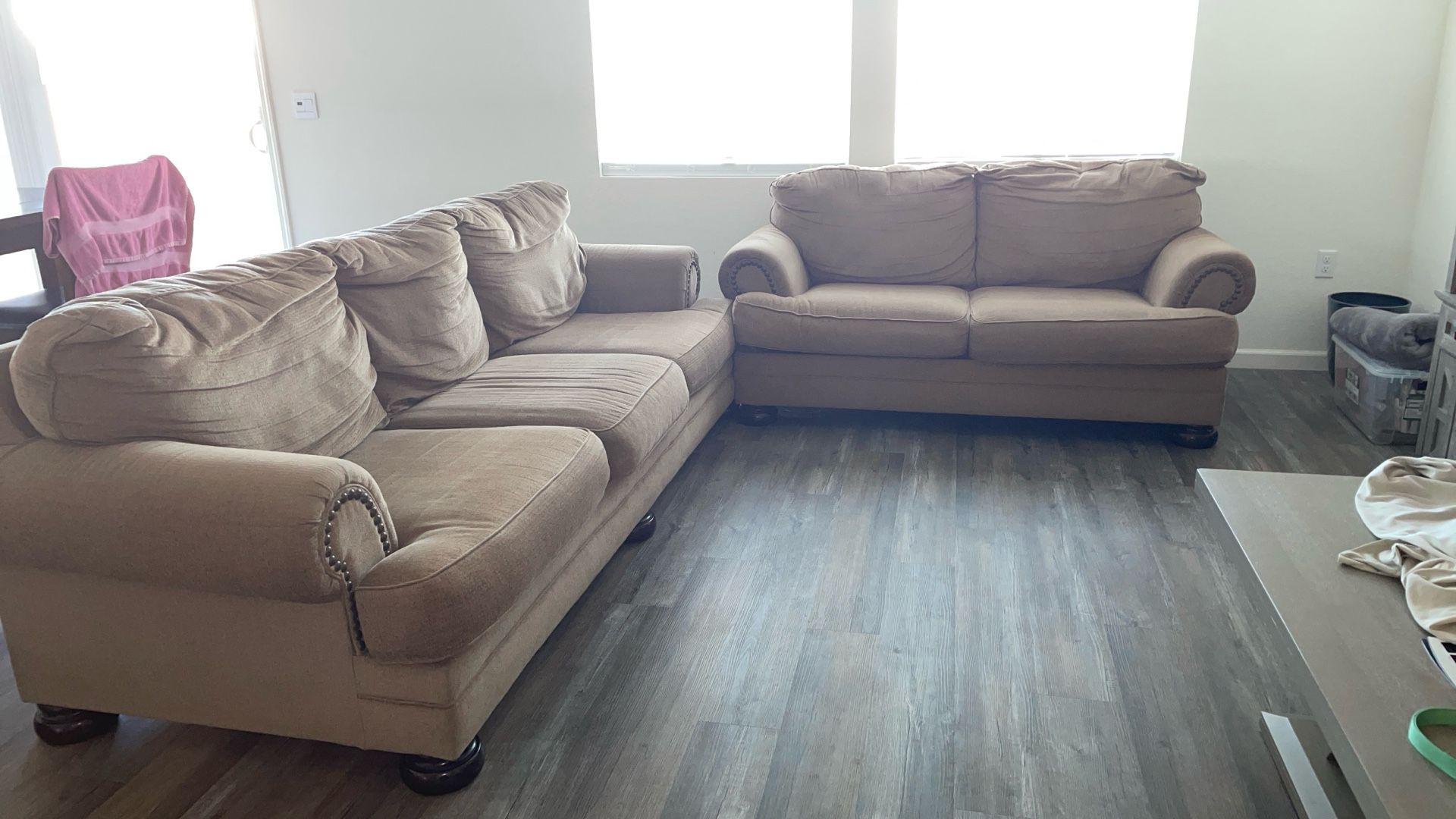 Sofa and loveseat also have coffee table to go with it