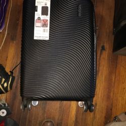 American Tourister traveling bag With Wheels 