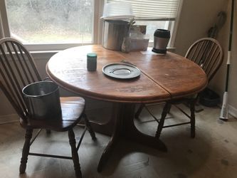 Round kitchen table and two chairs