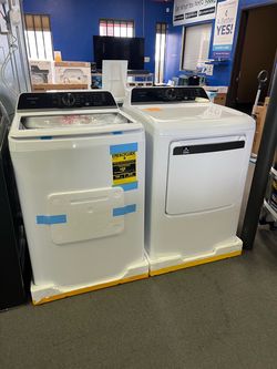 Frigidaire white and black washer and dryer