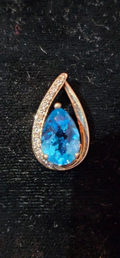 10k Gold Pear Shaped Blue Topaz With Diamond Pendant
