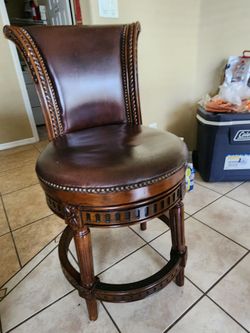 Pair of Ornate Swivel Bar Stools