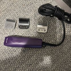 A dis Detachable Clipper With Guards Wahl