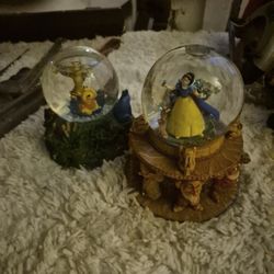 Snow White And The Seven Dwarfs And Winnie The Pooh And Tigger Snow Globes