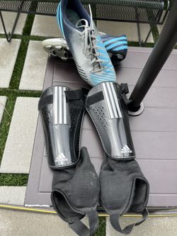 Addidas Size 7.5 Soccer Cletes with Addidas shin guards
