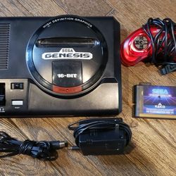 Enhanced Sega Genesis Model 1 with flash cart.