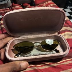 Miu Miu sun glasses