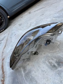09 Infiniti G37 ,G35, G25, left headlight tinted