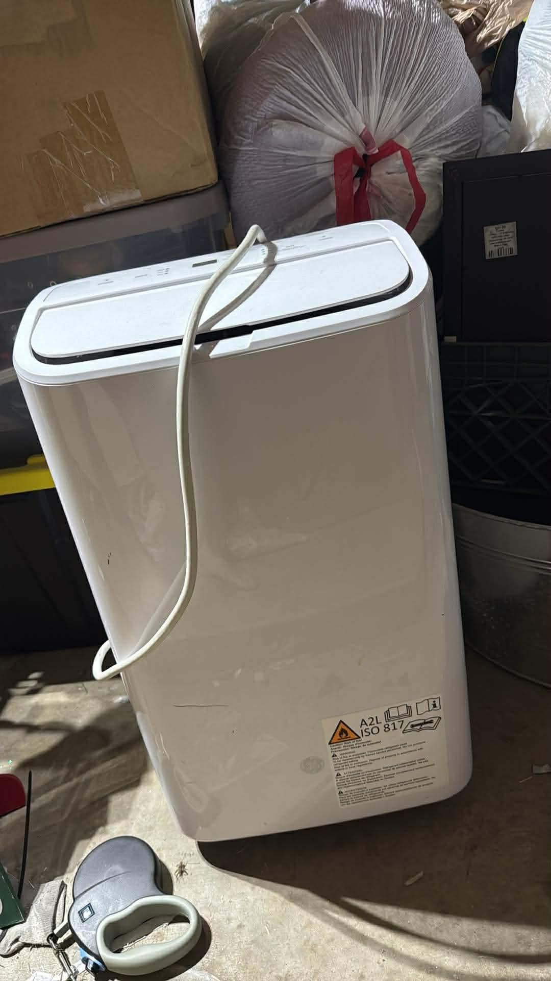GE PORTABLE AIR CONDITIONER