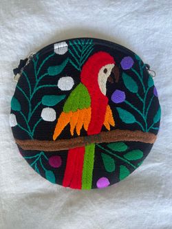 Small circular crossbody bag