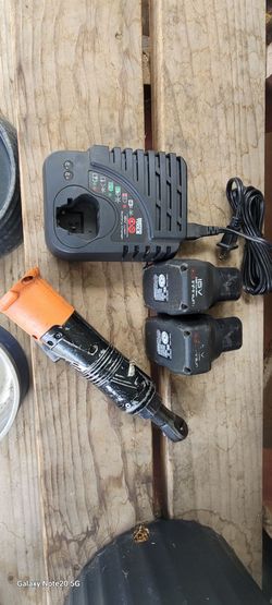 Matco 16 volt battery charger and  2 batteries