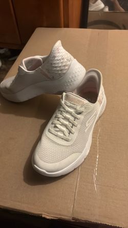 These are white Skechers GO WALK Flex Hands Free Slip-ins walking shoes