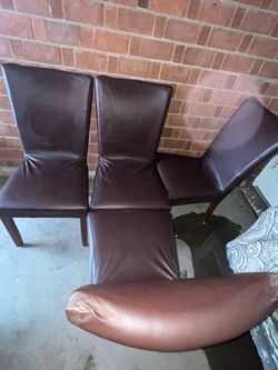 Four Brown Faux Leather Dining Chairs