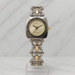 Elegant Montres Carlo “Le Elegant” women’s wristwatch, featuring a unique two-tone silver and gold design with a chic linked bracelet.