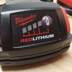Milwaukee 1.5 Battery With Charger, Only Used One Time..like New Condition PRICE IS FIRM