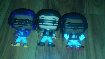 Pop football action figures.(Adrian Peterson,28), (Blake Bottles,5),(Jadeveon Clowney,90.