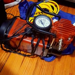 Portable Air Compressor And Connected With Jumping Cables Combined 