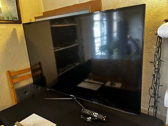 Samsung 55” TV (49.5”W x 31.5” T {including base})