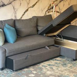 Gray Sectional Couch With Storage and Pull Out Bed