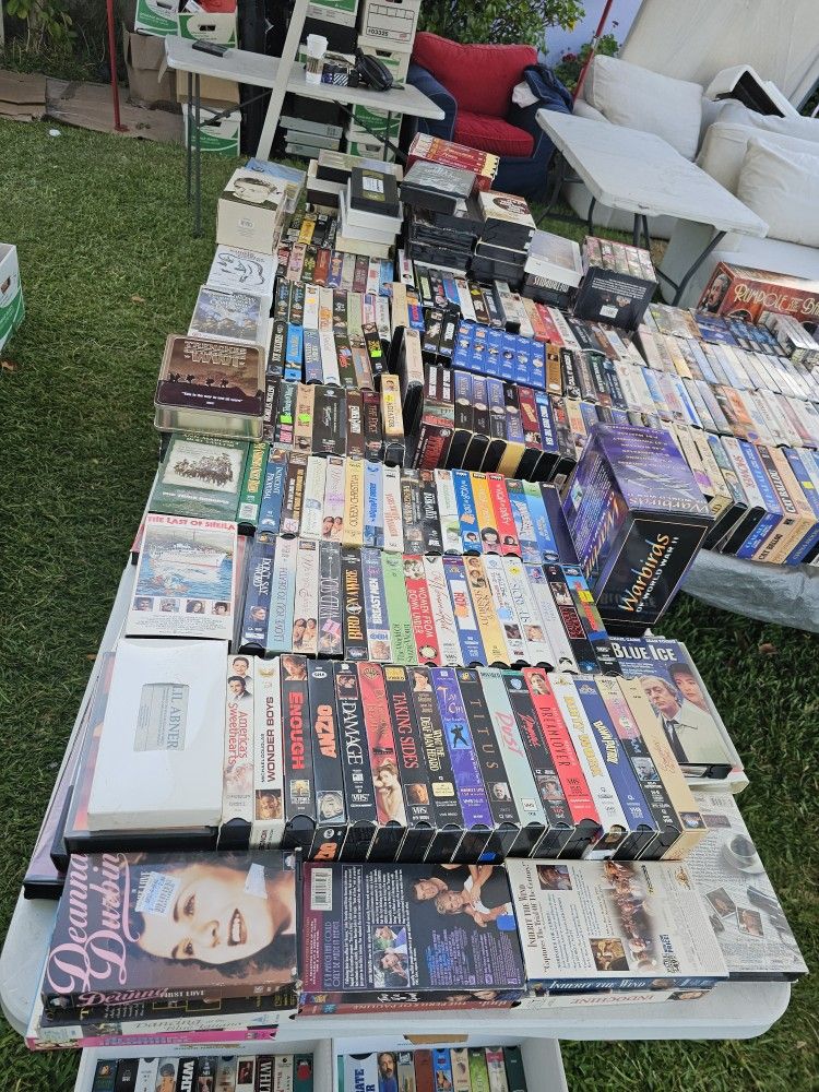 $1 VHS MOVIES AND DVDS YARD SALE