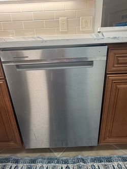 Stainless steel refrigerator and dishwasher