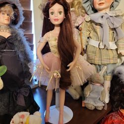 Porcelain ballerina doll was stand beautiful.Perfect has been in a case