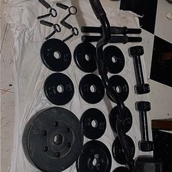 Weights  (11) 2.5 Lb (2) 7.5 lb    (2) 5 Lb (1) 15 Lb (1) Bar (4) Locks 