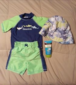 12 months swim shorts, water shirt,  sun protection hat, small amount of sunscreen $5 FIRM