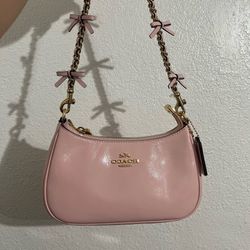 Coach mini soft pink Teri with bow strap