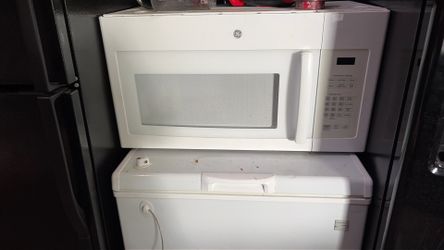 White GE over the range microwave barely used