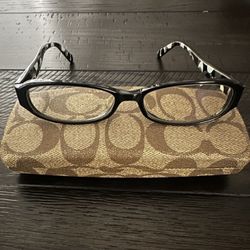 Authentic Coach woman's eyeglasses black and white $75