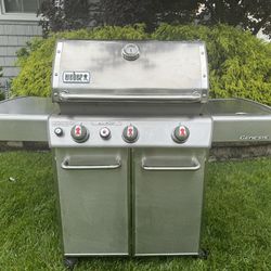Weber Genesis Stainless Steel Propane BBQ grill With Sear Burner, Side Burner And Cover. 