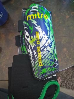 Brand new mitre junior shin guards