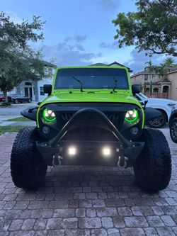 Jeep Wrangler Sport – Lifted – Clean Title