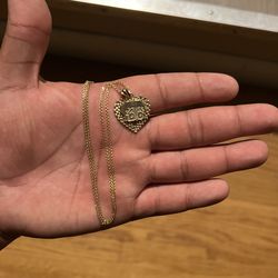 gold pendant and chain