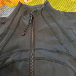 Woman emerald green Lululemon Define Jacket