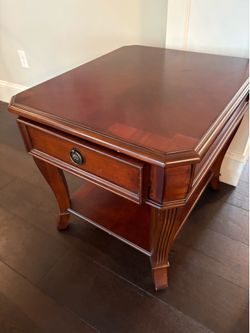 Two matching side tables
