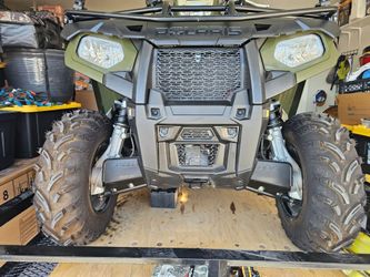 2016 POLARIS  SPORTMAN 450 H.O. EFI AWD GREEN with the trailer