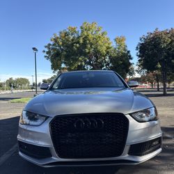 2015 Audi A4 • 2.OT Quattro Premium Sedan 4D