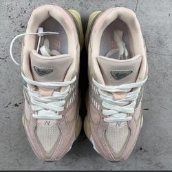 New Balance 9060 trainers in pink and cream